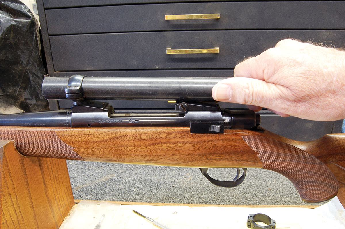 To install the front rotary dovetail ring of a Redfield or a Leupold mount, clamp a 1-inch rod in the ring and twist it.